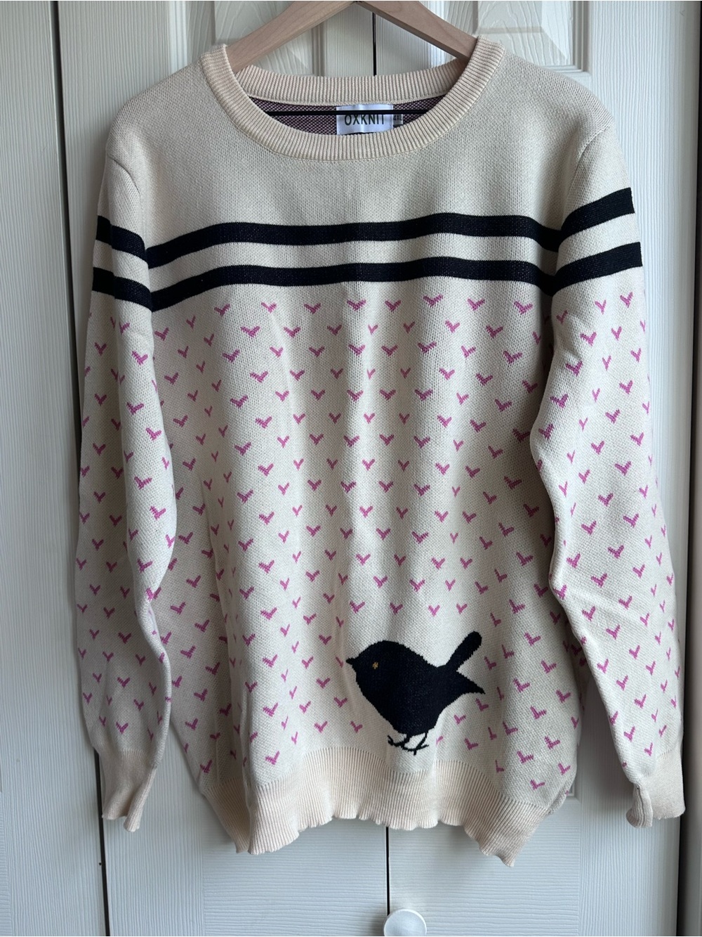 OXKnit Cream Crewneck Sweater with Pink Heart Pattern and Black Bird